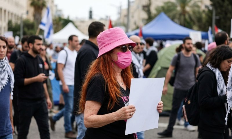 הבעל נחקר על מימון טרור - האישה מובילה את ההפגנות נגד ישראל